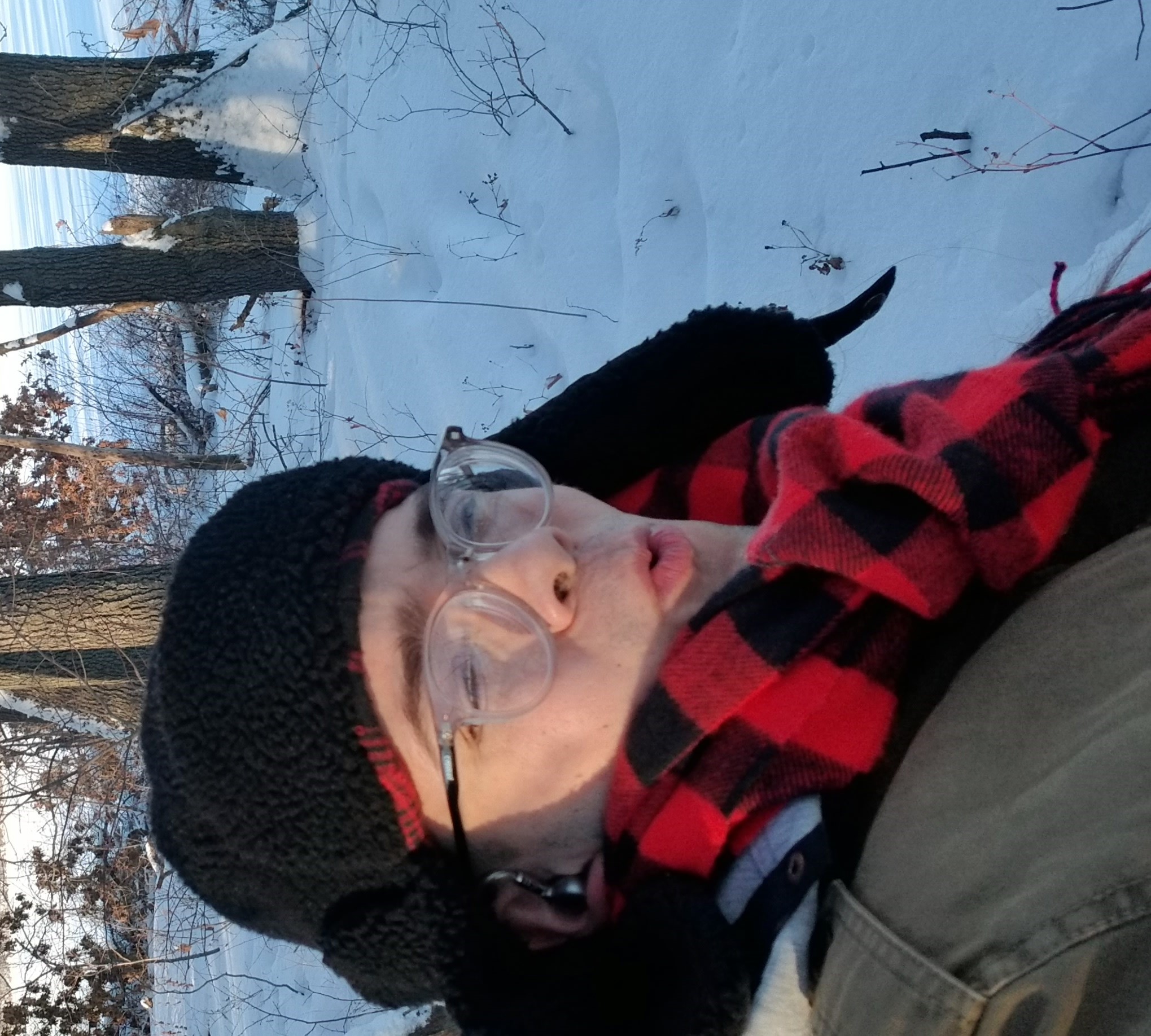 picture of me surrounded by wooded area and snow